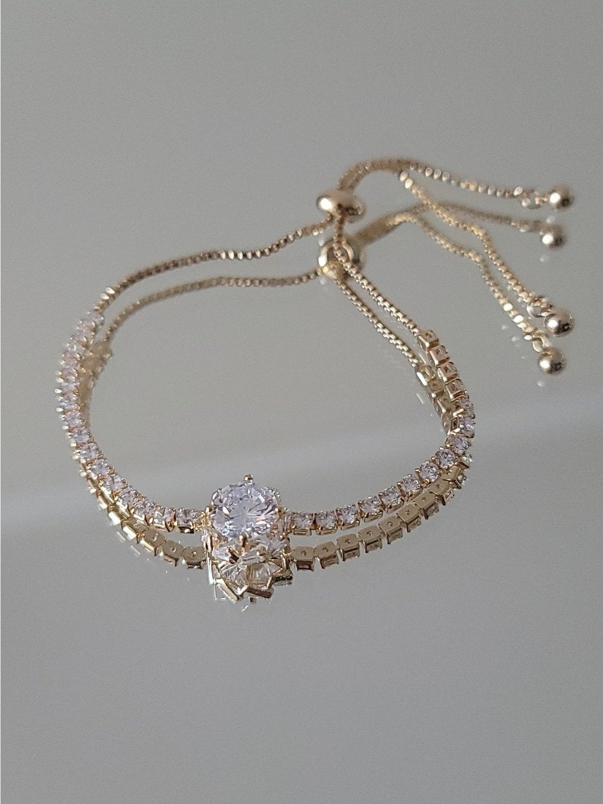 PULSERA AJUSTABLE LUZ DORADA