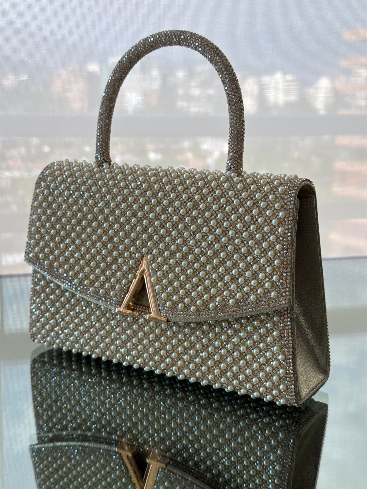 CARTERA DE FIESTA ESTELAR DORADA