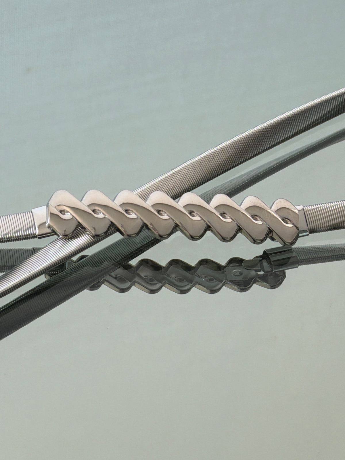 CINTURON ELASTICADO PLATEADO ECLAT