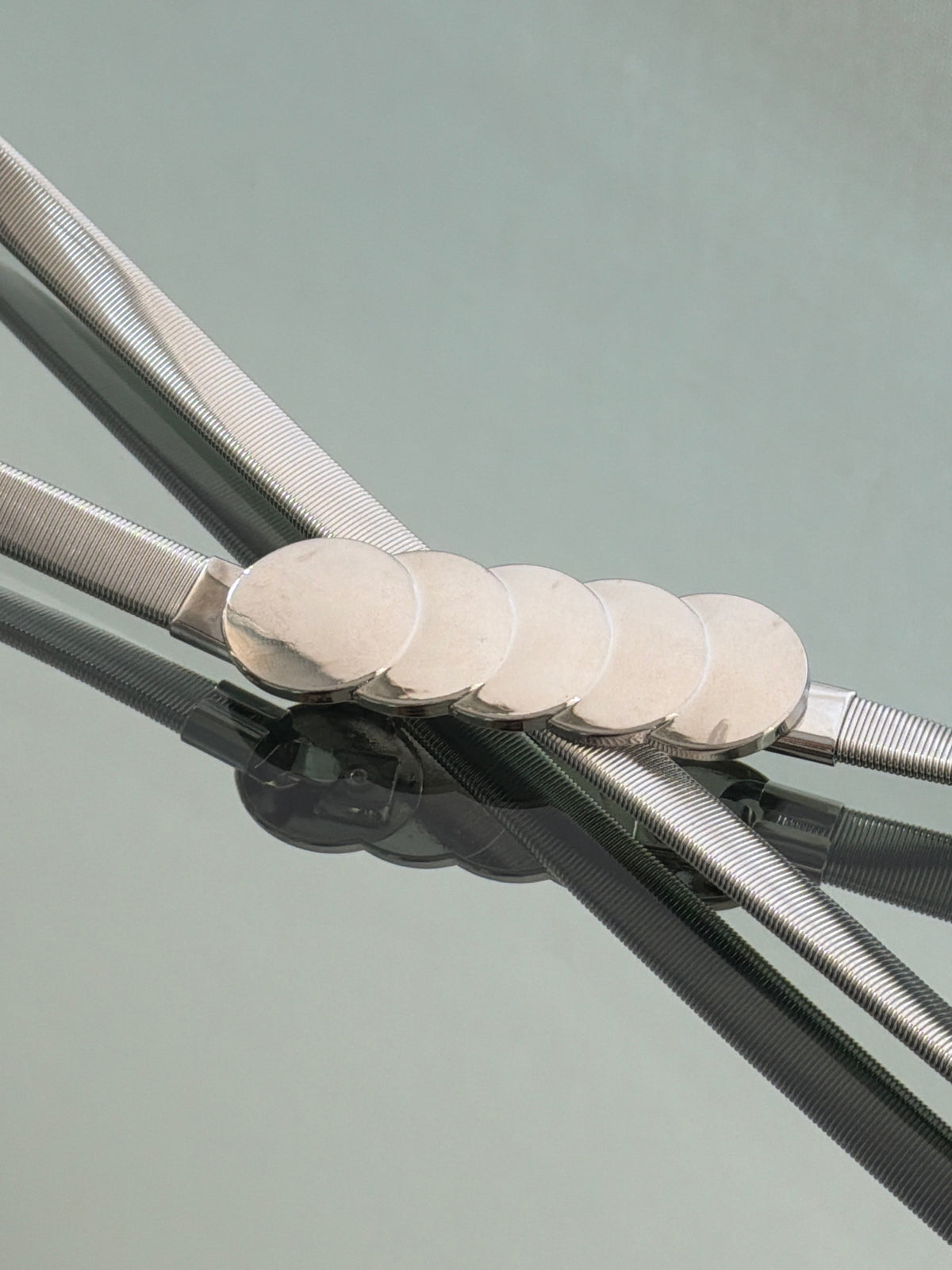 CINTURON ELASTICADO PLATEADO RADIANCE