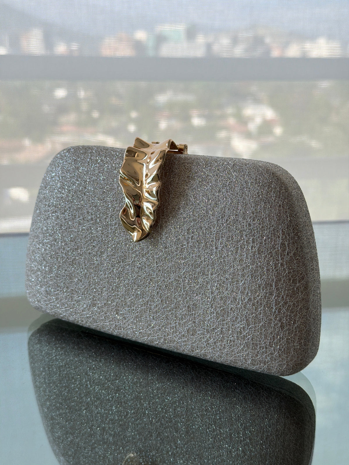 CARTERA DE FIESTA RADIANCE DORADA