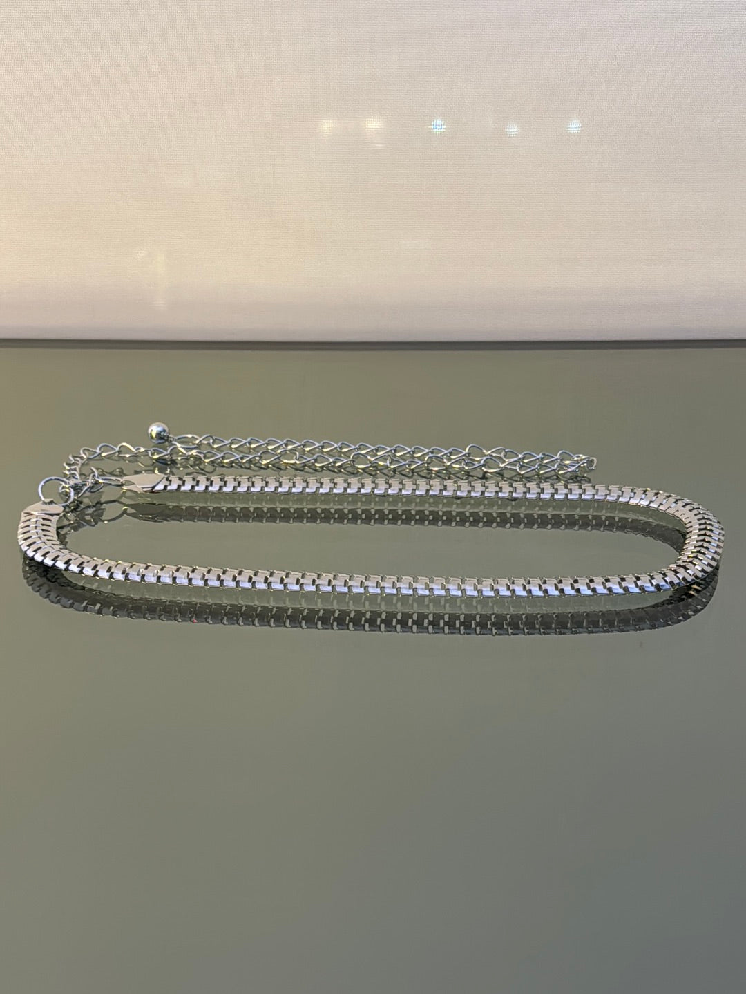 CINTURON AJUSTABLE PLATEADO C3