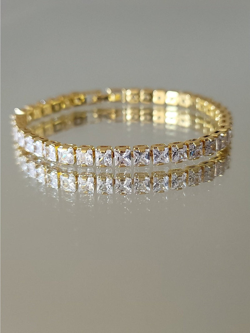 PULSERA DE FIESTA CUAD DORADA