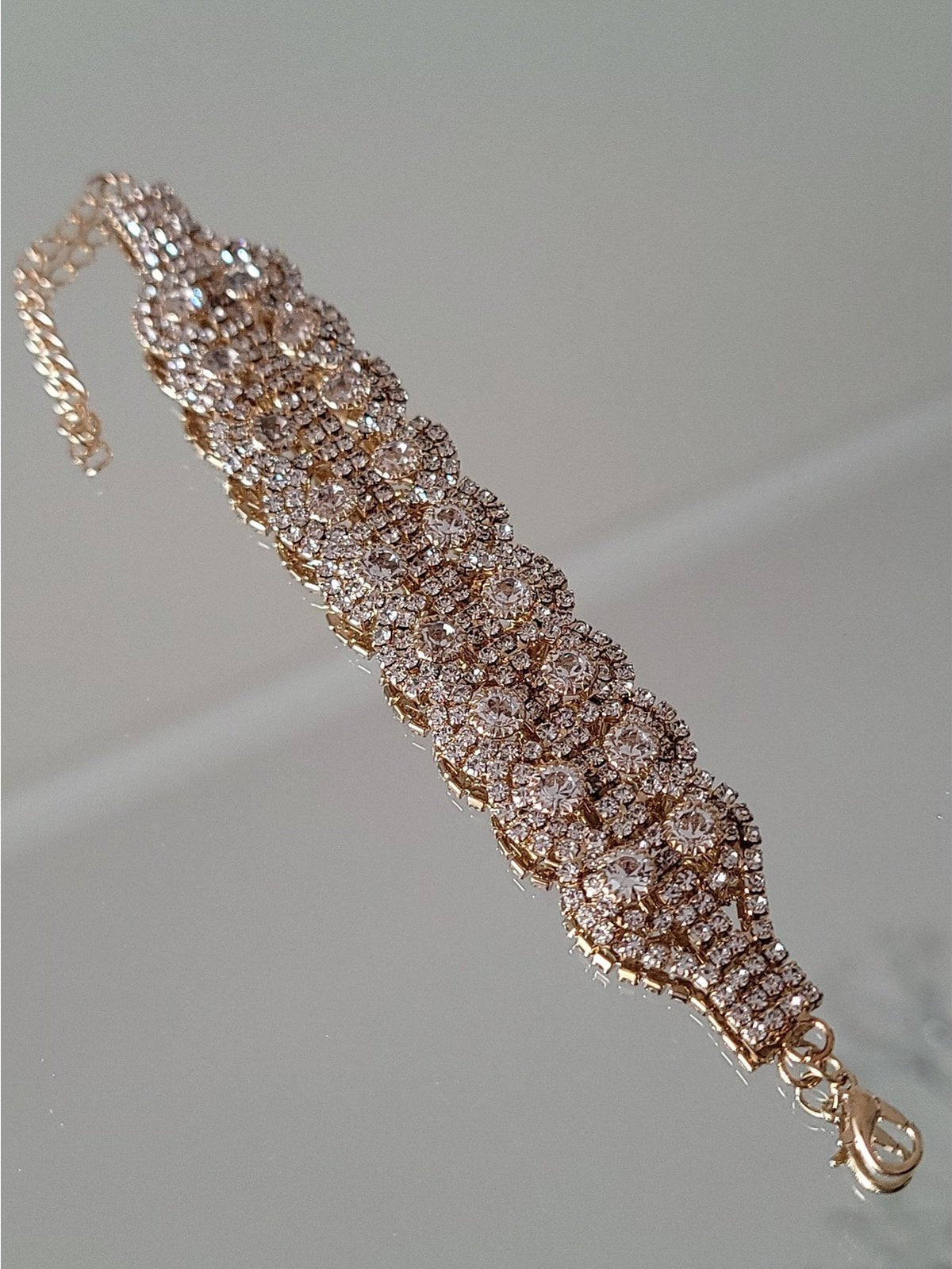 PULSERA STRASS SKY DORADA